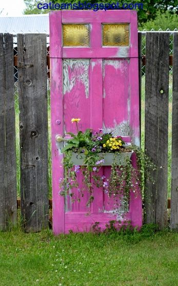 Pink planter made from an old door