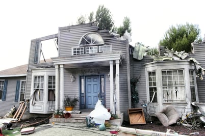 Home damaged by hurricane