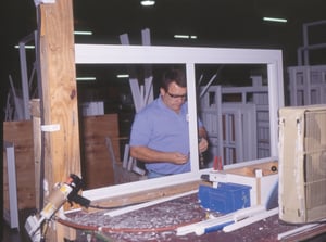 Impact glass window being manufactured