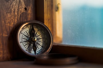 compass placed on window sill